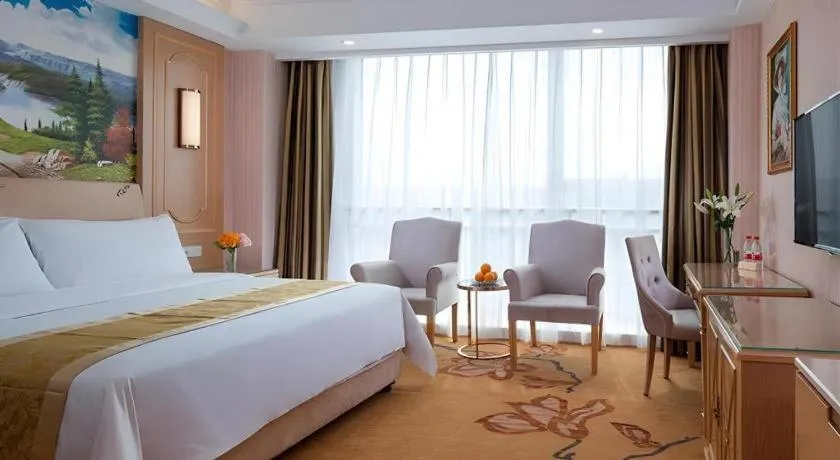 Bed in Vienna Hotel Chengdu Chadianzi Toursim Center