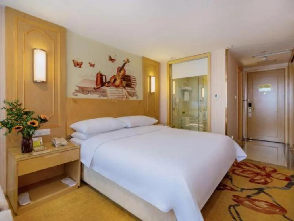 Bed in Vienna Hotel Chengdu Chadianzi Toursim Center