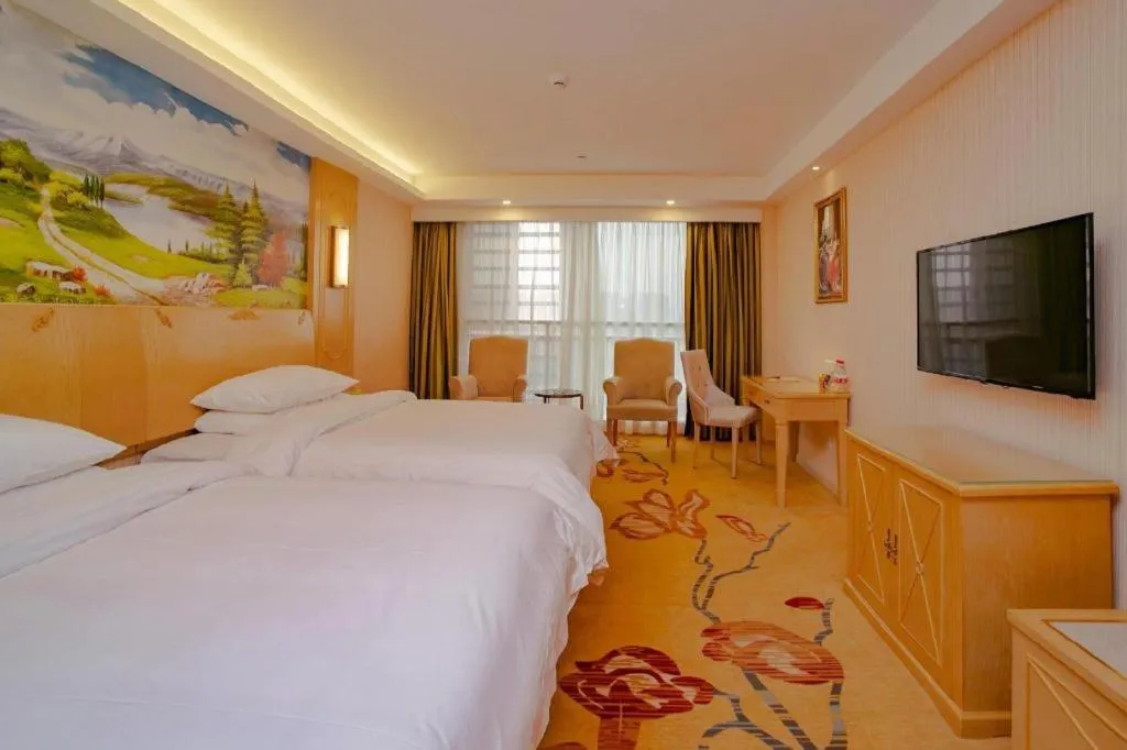 Bed in Vienna Hotel Chengdu Chadianzi Toursim Center