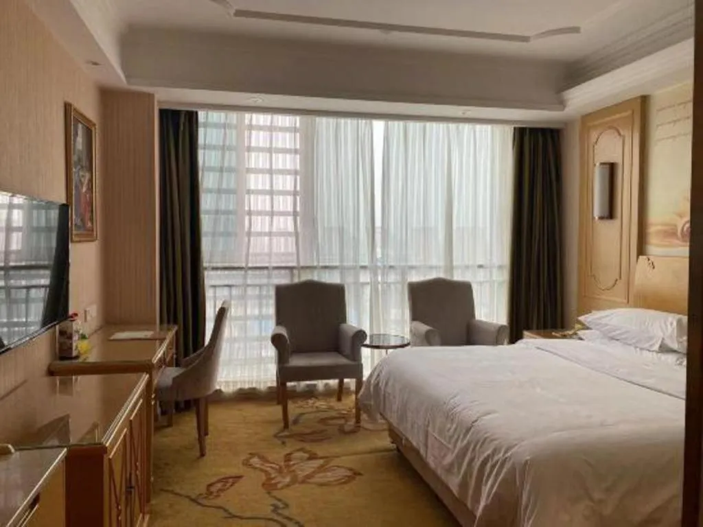 Bed in Vienna Hotel Chengdu Chadianzi Toursim Center