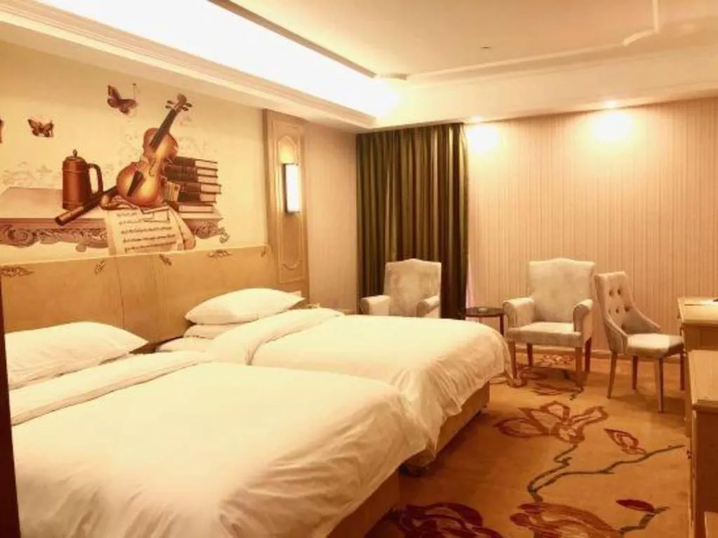Bed in Vienna Hotel Chengdu Chadianzi Toursim Center