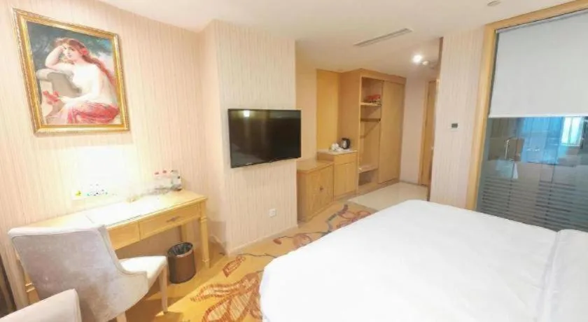 Bed in Vienna Hotel Chengdu Chadianzi Toursim Center