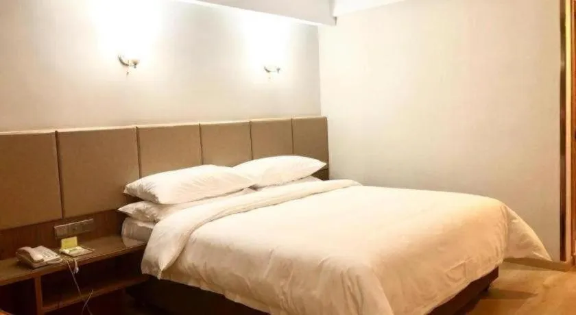 Bed in Vienna Hotel Chengdu Chadianzi Toursim Center