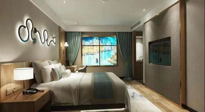 Bed in Vienna Hotel Chengdu Chadianzi Toursim Center