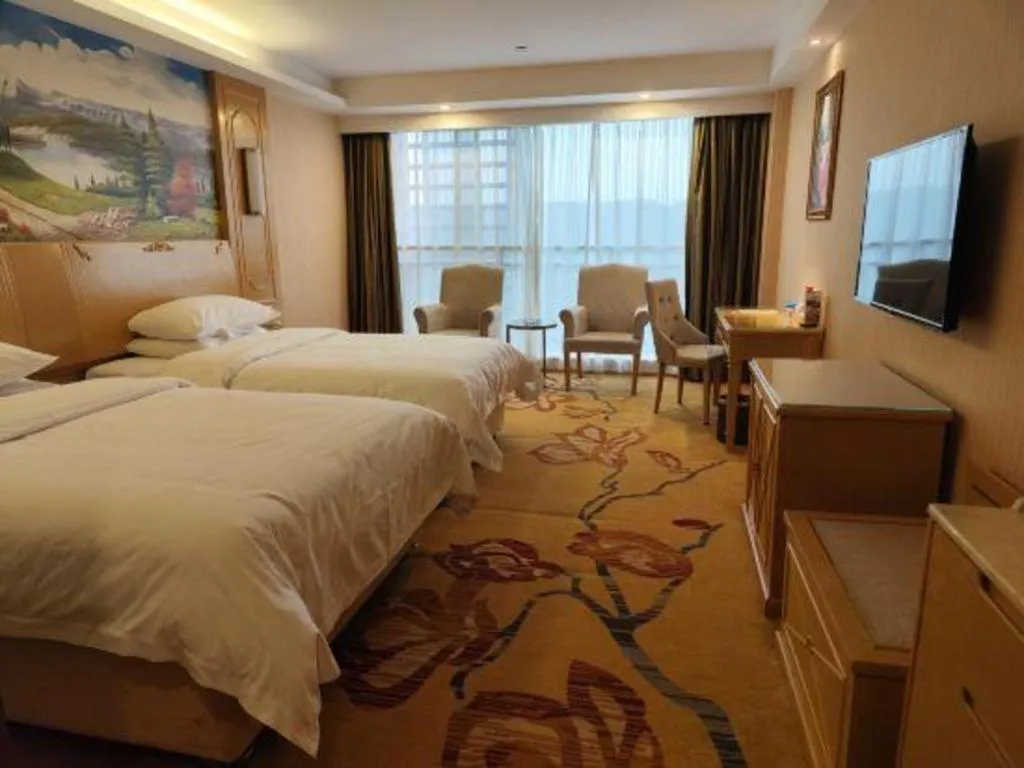 Bed in Vienna Hotel Chengdu Chadianzi Toursim Center