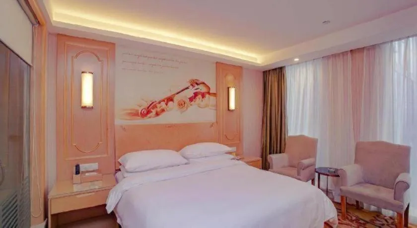 Bed in Vienna Hotel Chengdu Chadianzi Toursim Center