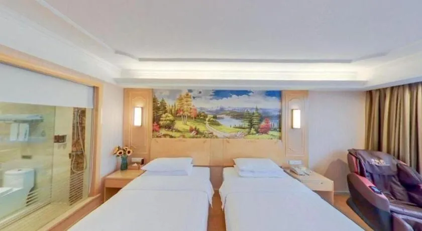 Bed in Vienna Hotel Chengdu Chadianzi Toursim Center