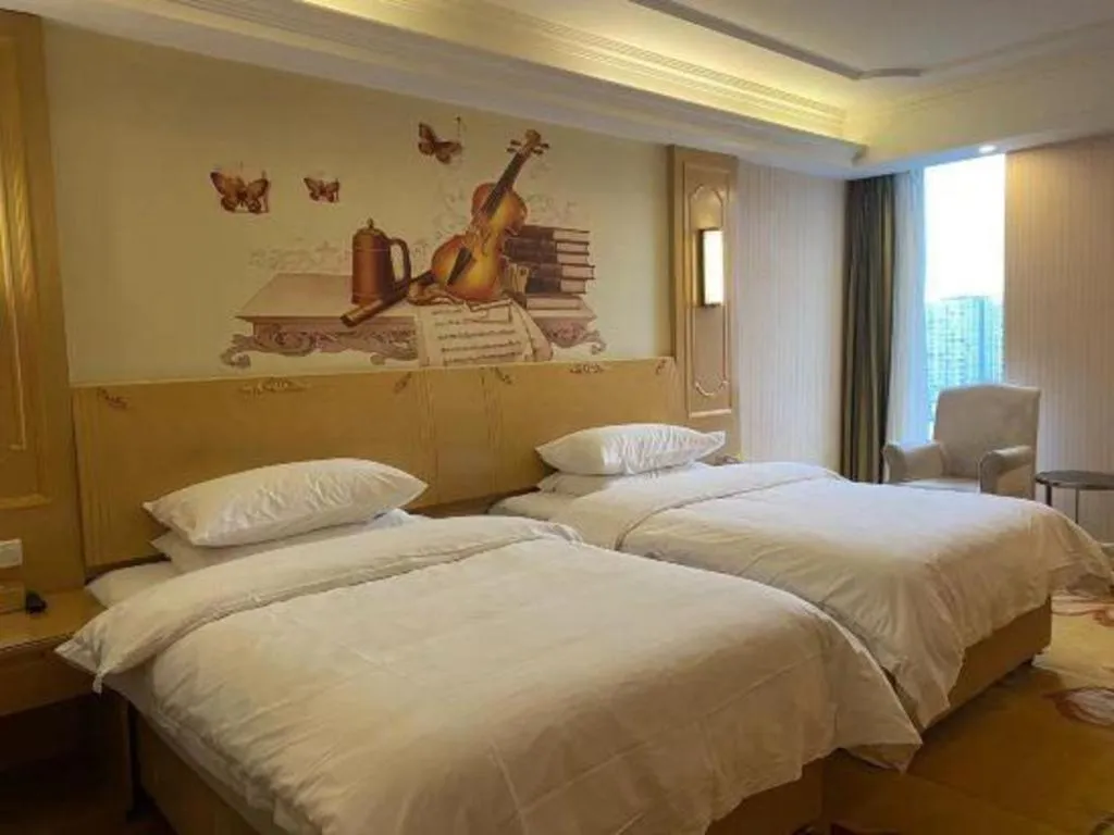 Bed in Vienna Hotel Chengdu Chadianzi Toursim Center