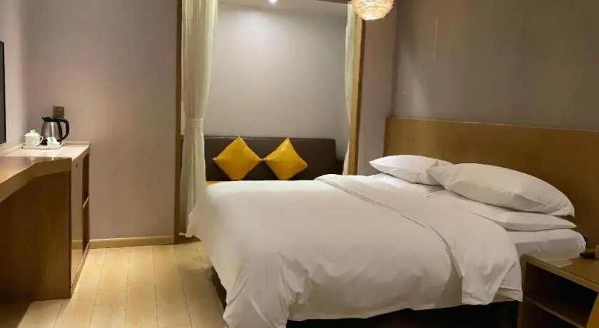 Bed in Vienna Hotel Chengdu Chadianzi Toursim Center