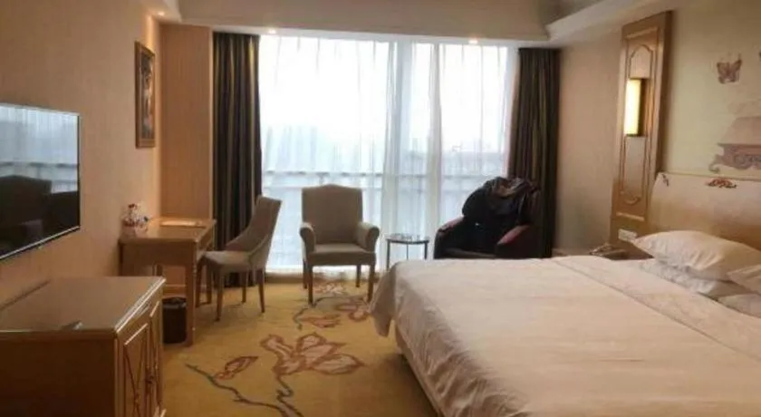 Bed in Vienna Hotel Chengdu Chadianzi Toursim Center