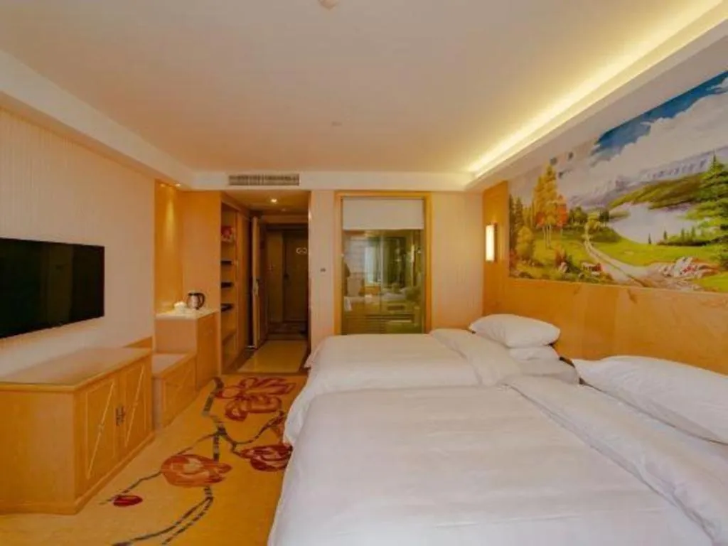 Bed in Vienna Hotel Chengdu Chadianzi Toursim Center