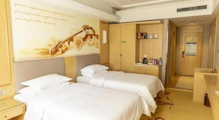 Bed in Vienna Hotel Shandong Linyi Mengyin