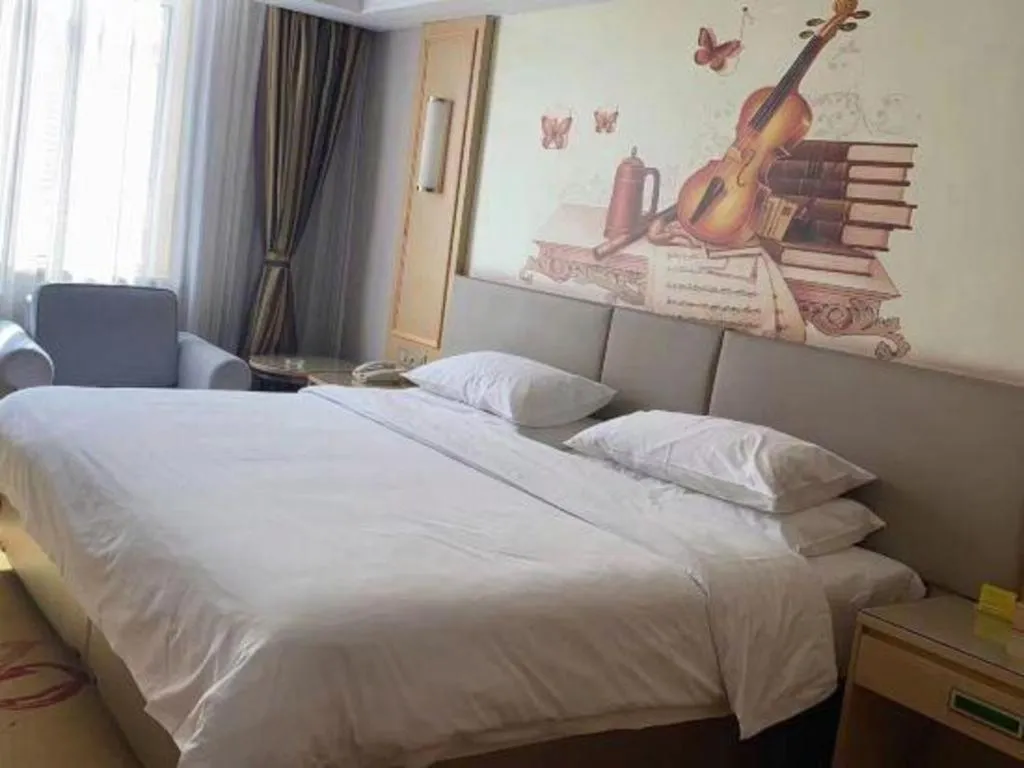 Bed in Vienna Hotel Shandong Linyi Mengyin