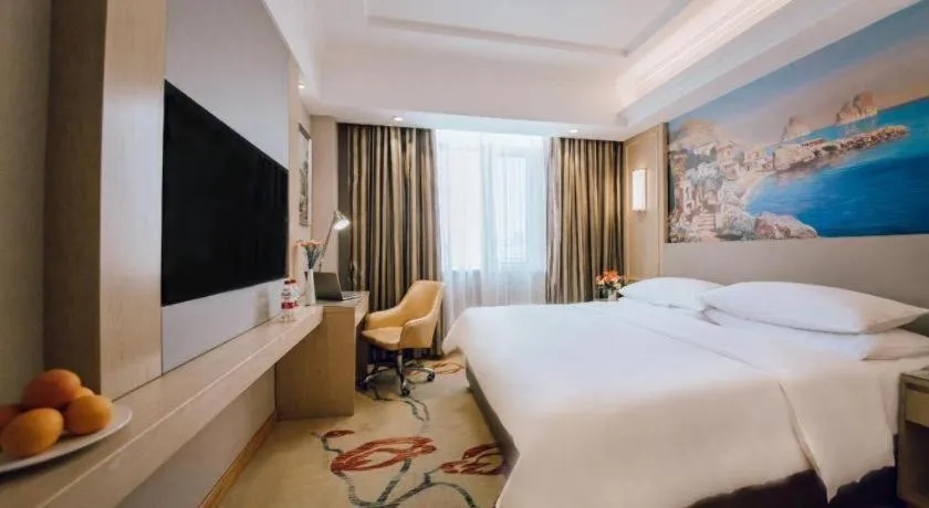 Bed in Vienna Hotel Shandong Linyi Mengyin