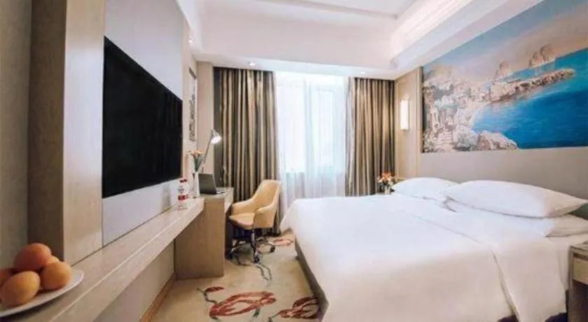 Bed in Vienna Hotel Shandong Linyi Mengyin