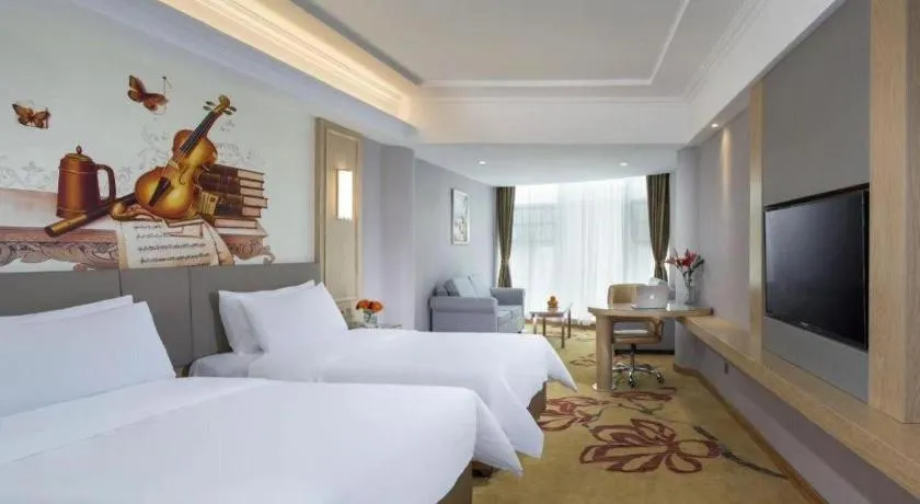 Bed in Vienna Hotel Shandong Linyi Mengyin