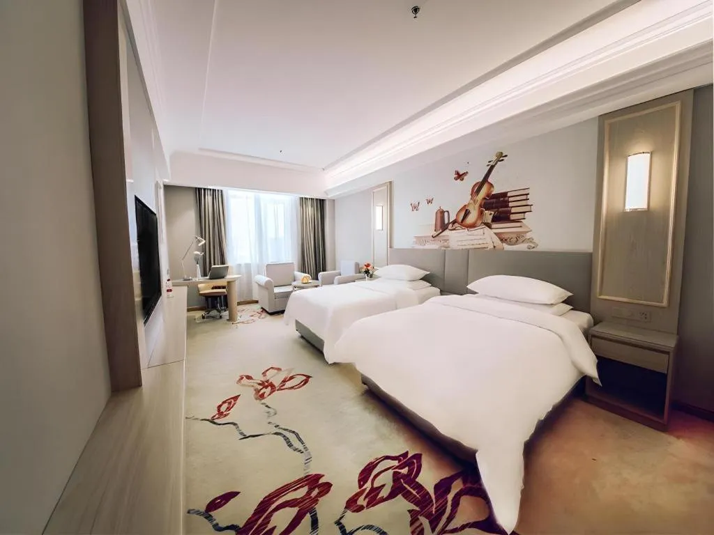 Bed in Vienna Hotel Shandong Linyi Mengyin