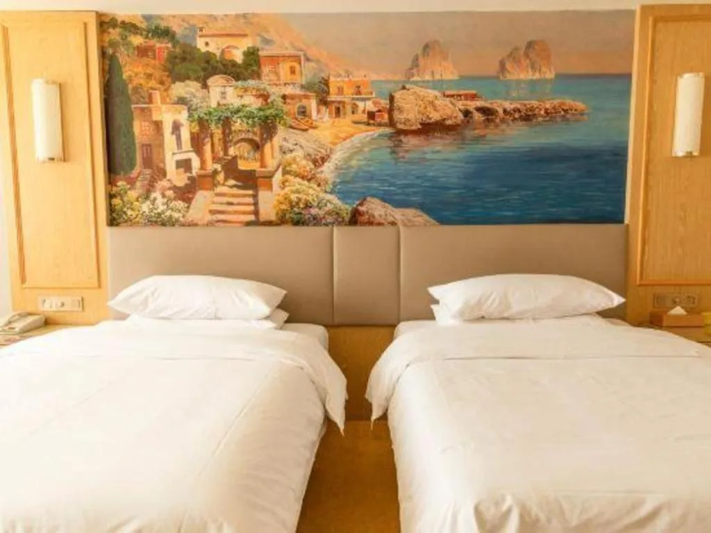 Bed in Vienna Hotel Shandong Linyi Mengyin