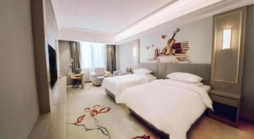 Bed in Vienna Hotel Shandong Linyi Mengyin