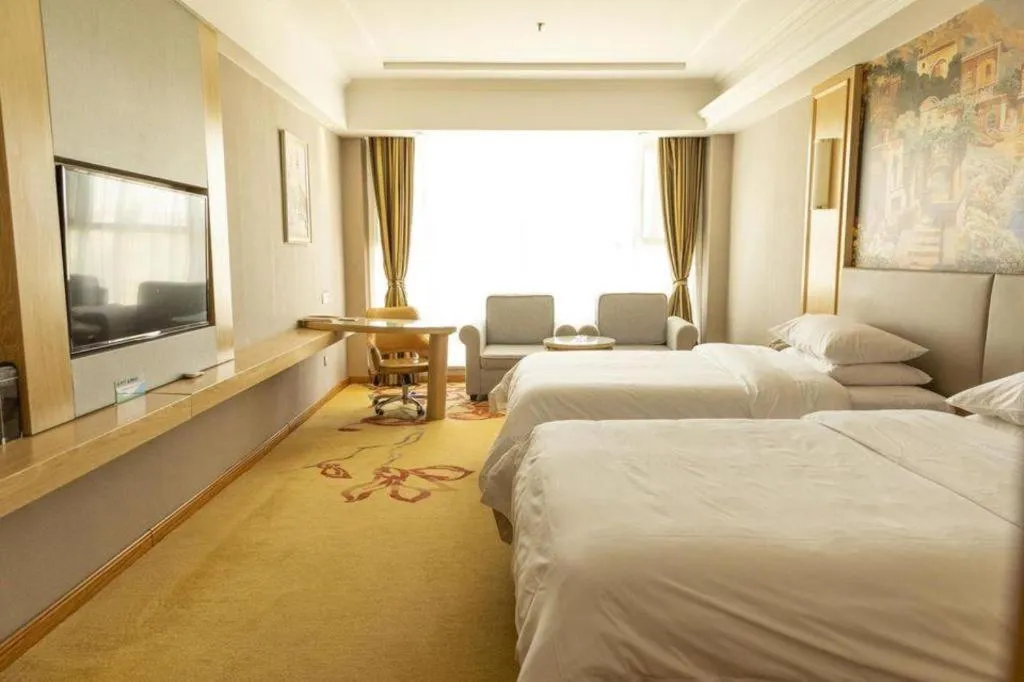 Bed in Vienna Hotel Shandong Linyi Mengyin