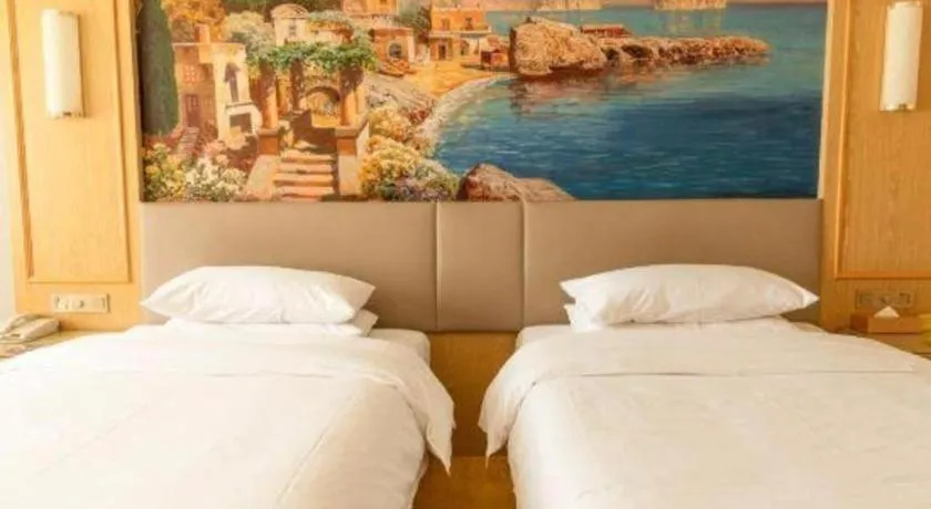 Bed in Vienna Hotel Shandong Linyi Mengyin