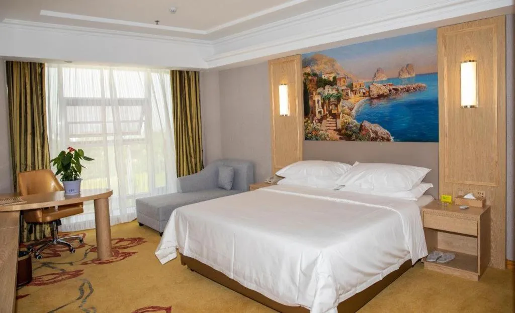 Bed in Vienna Hotel Shandong Linyi Mengyin
