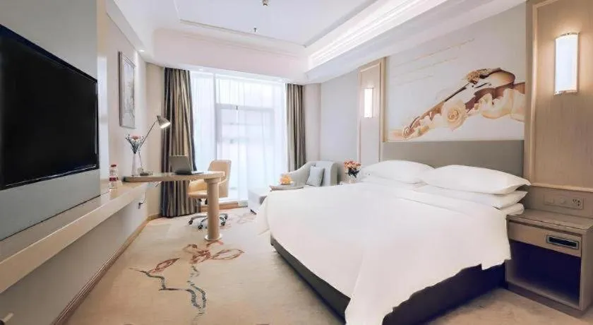 Bed in Vienna Hotel Shandong Linyi Mengyin