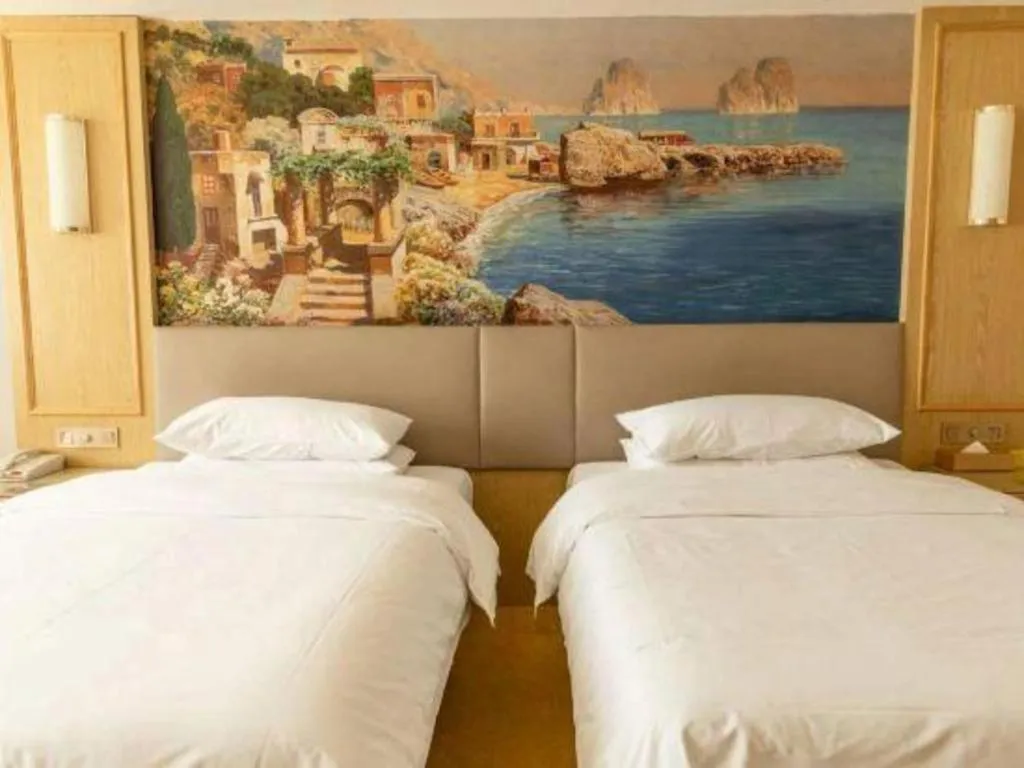 Bed in Vienna Hotel Shandong Linyi Mengyin