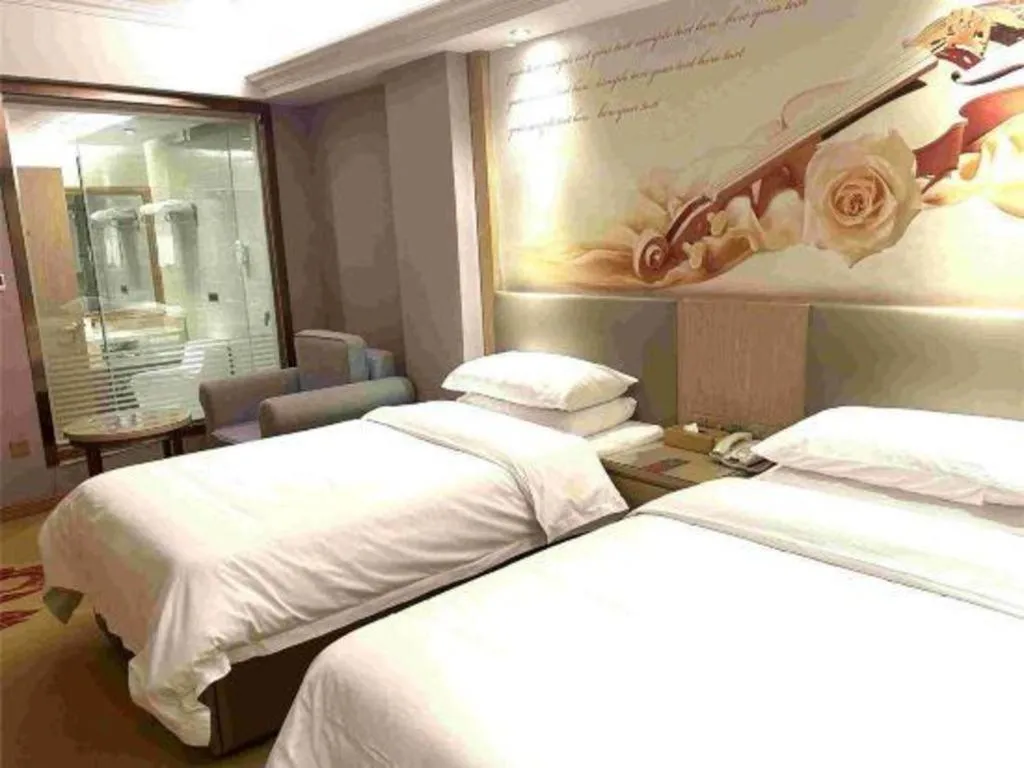 Bed in Vienna Hotel Shandong Linyi Mengyin