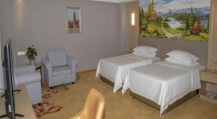 Bed in Vienna Hotel Shandong Linyi Mengyin