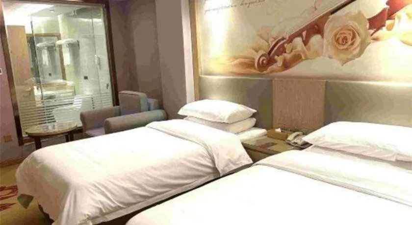 Bed in Vienna Hotel Shandong Linyi Mengyin