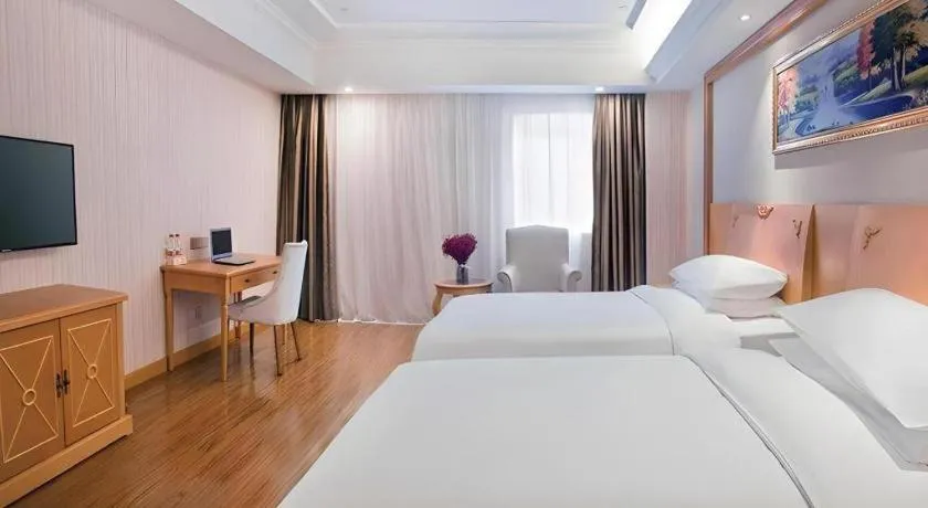 Bed in Vienna Hotel Hubei Enshi Railway Station