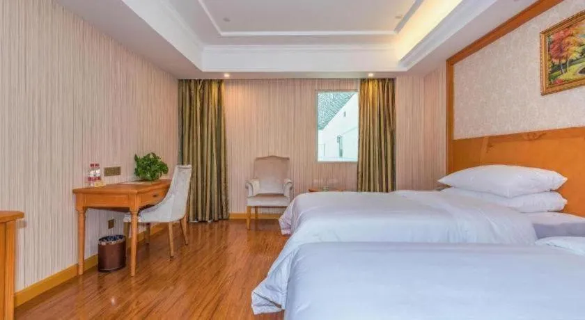 Bed in Vienna Hotel Hubei Enshi Railway Station