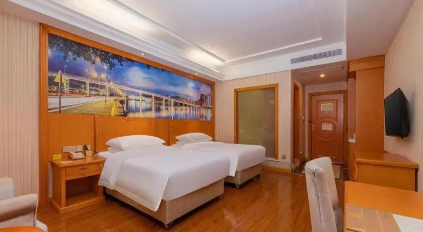 Bed in Vienna Hotel Hubei Enshi Railway Station Bed in Vienna Hotel Hubei Enshi Railway Station