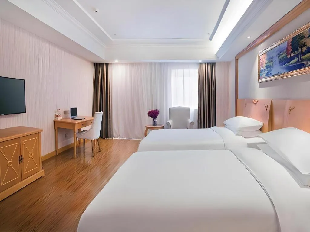 Bed in Vienna Hotel Hubei Enshi Railway Station