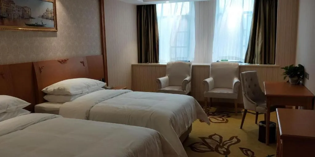 Bed in Vienna Hotel Hubei Enshi Railway Station