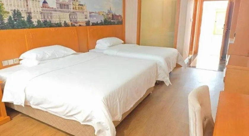 Bed in Vienna Hotel Hubei Enshi Railway Station