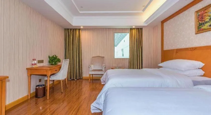 Bed in Vienna Hotel Hubei Enshi Railway Station