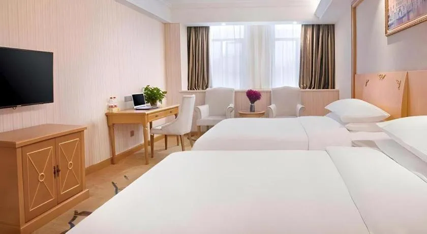 Bed in Vienna Hotel Hubei Enshi Railway Station