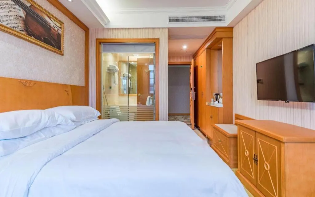 Bed in Vienna Hotel Hubei Enshi Railway Station