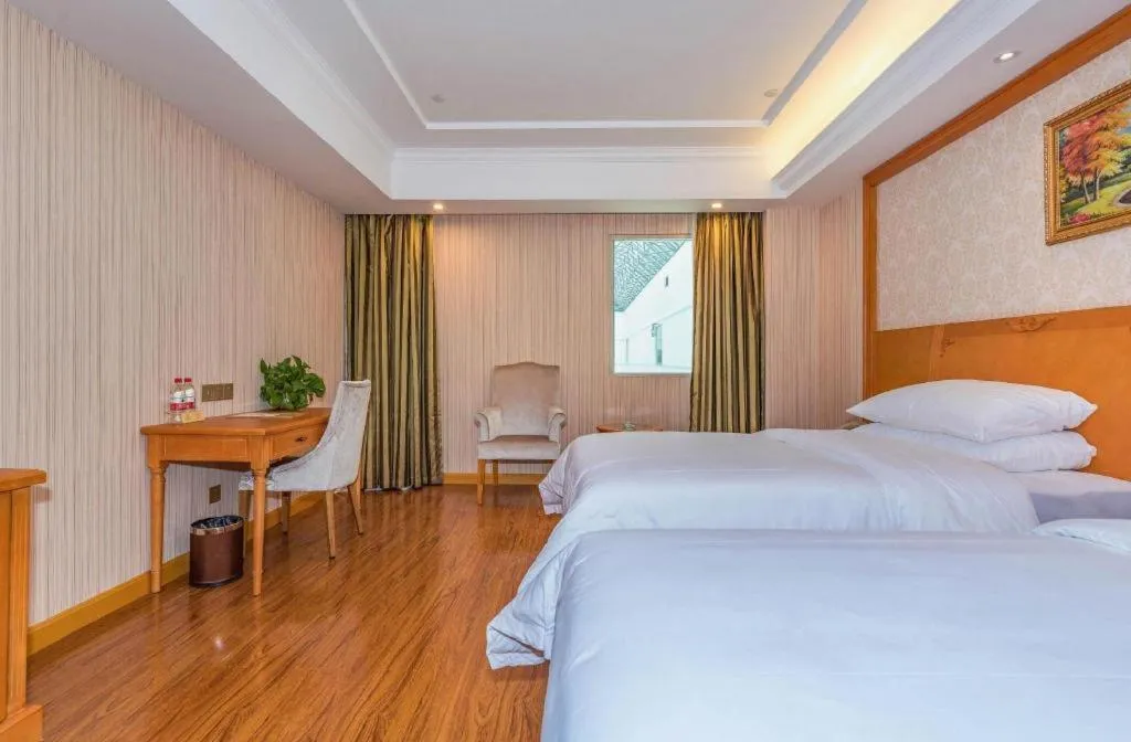 Bed in Vienna Hotel Hubei Enshi Railway Station