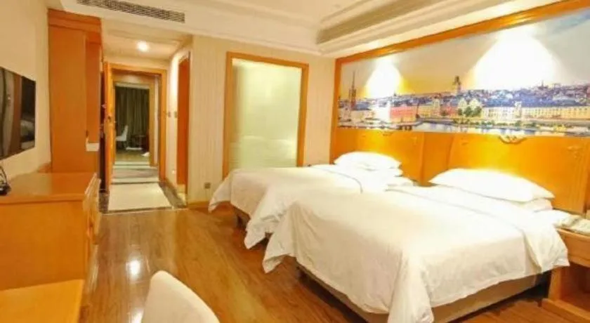 Bed in Vienna Hotel Hubei Enshi Railway Station