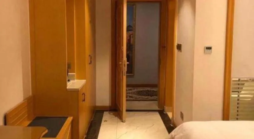 Bed in Vienna Hotel Guangdong Zhaoqing Sihui Tianguangxu