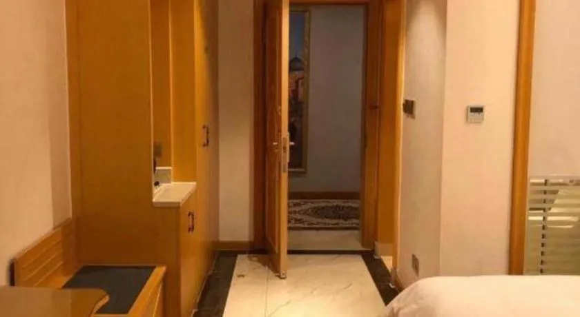 Bed in Vienna Hotel Guangdong Zhaoqing Sihui Tianguangxu