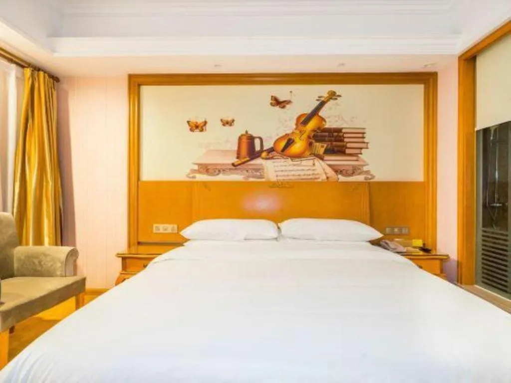 Bed in Vienna Hotel Shanghai Songjiang Market Miaoqian Street