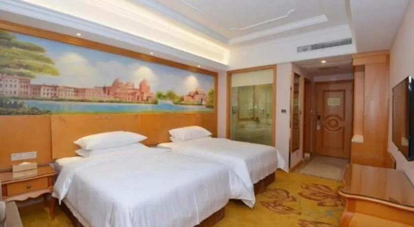 Bed in Vienna Hotel Shanghai Songjiang Market Miaoqian Street