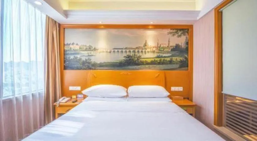 Bed in Vienna Hotel Shanghai Songjiang Market Miaoqian Street