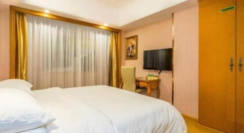 Bed in Vienna Hotel Shanghai Songjiang Market Miaoqian Street