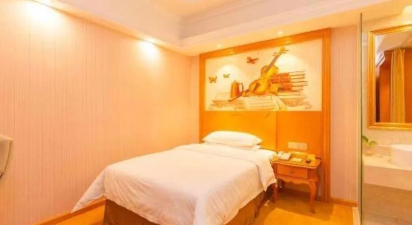 Bed in Vienna Hotel Shanghai Songjiang Market Miaoqian Street