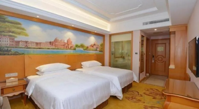 Bed in Vienna Hotel Shanghai Songjiang Market Miaoqian Street